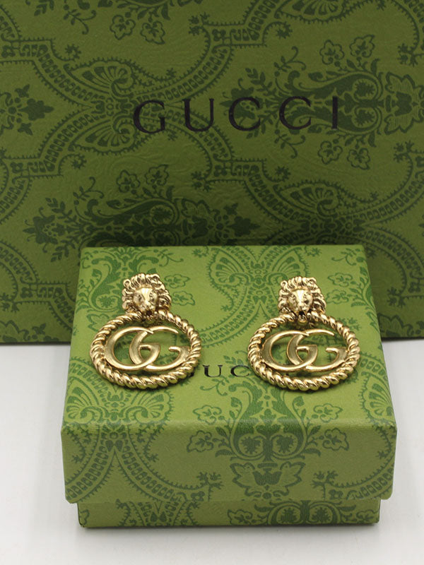 حلق قوتشي انتيك مدور كبير حلق gucci ذهبي