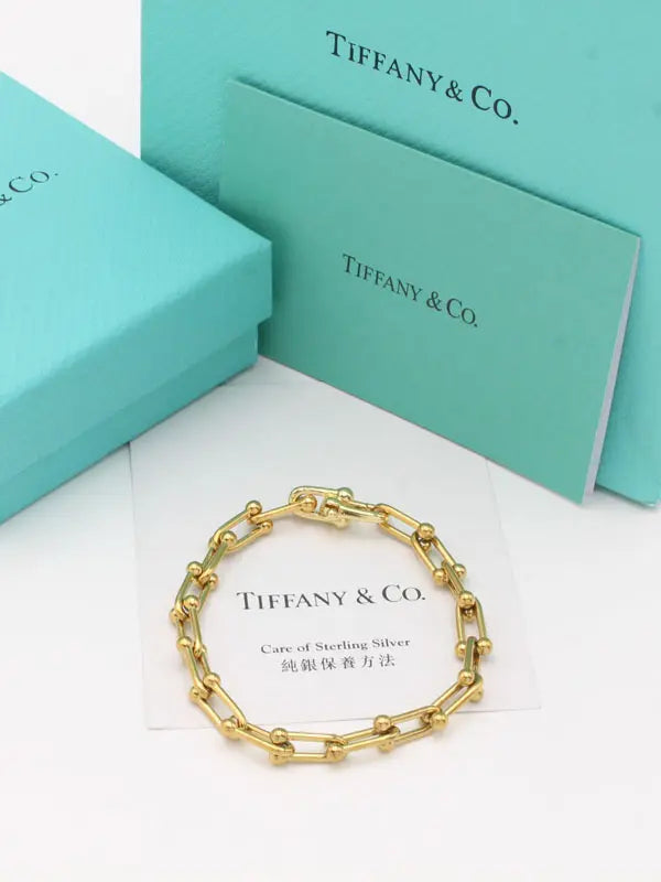 اسوارة تيفاني ميتال قولد نيو اسواره tiffany ذهبي