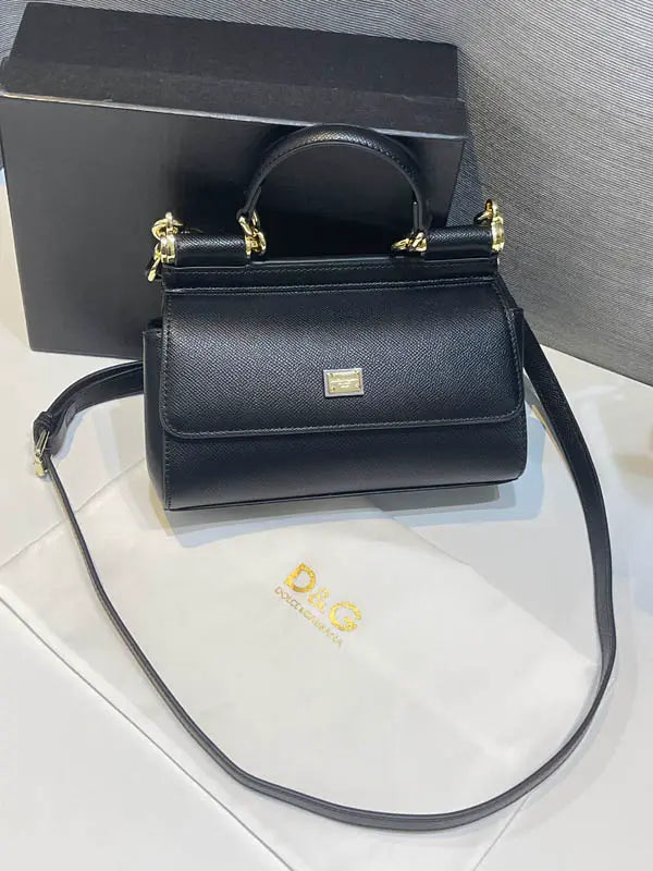 شنطة دولتشي قبانا اسود جلد ماستر شنط وحقائب tory burch