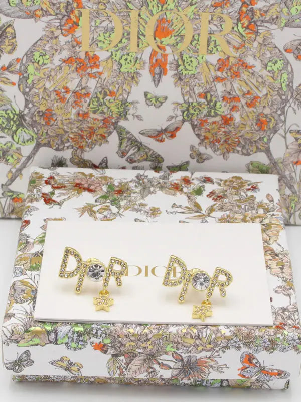 حلق ديور وذ ستون 679 ماستر حلق dior ذهبي