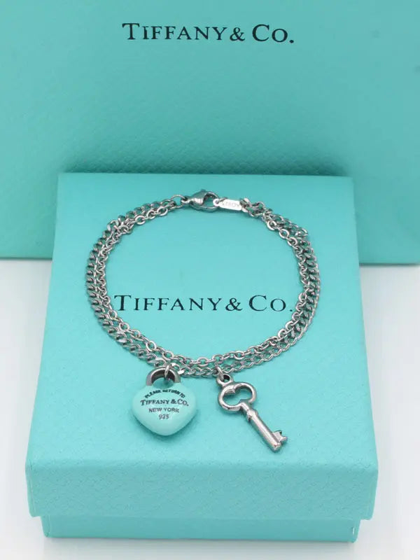 اسوارة تيفاني ميتال بلو هارت اند كي اسواره tiffany فضي