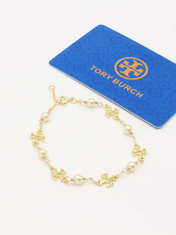 اسوارة توري بورش بيرلز ماستر اسواره tory burch