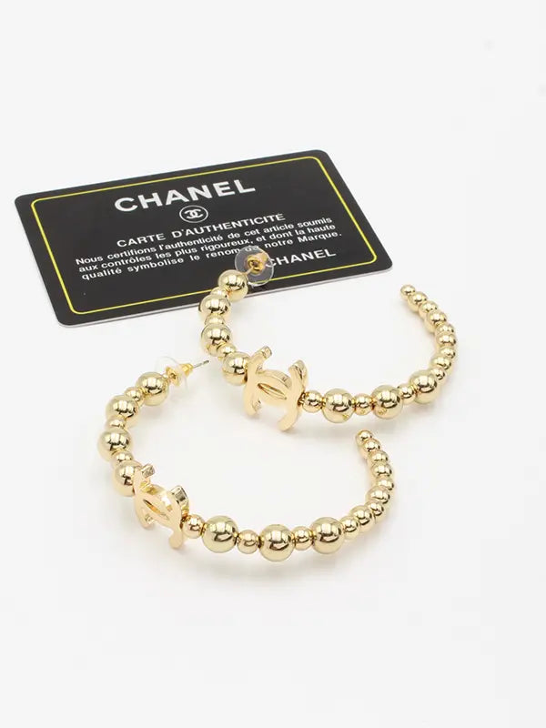 حلق شانيل كبير ميتال ذهبي لوقو حلق chanel
