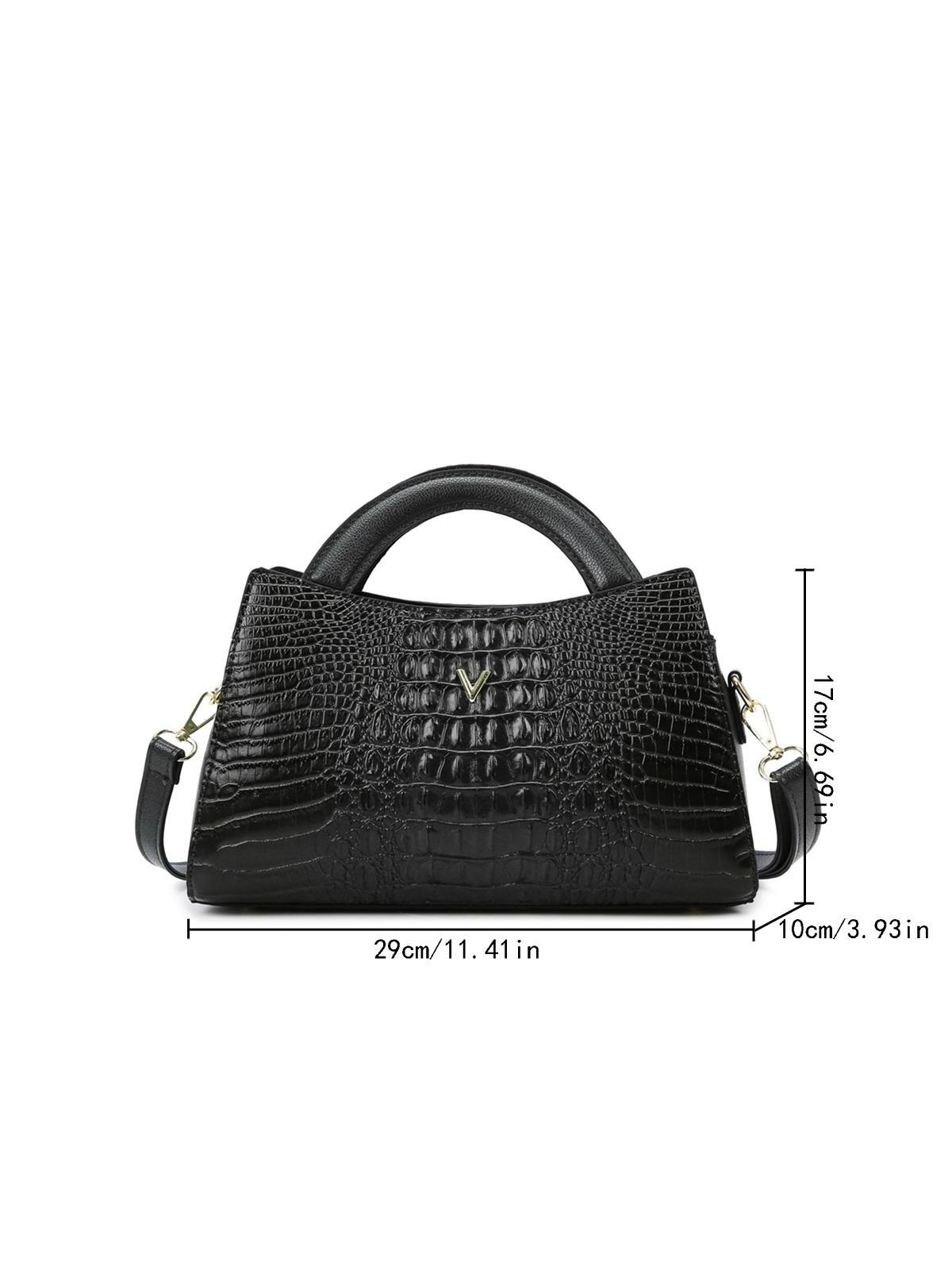 حقيبة يد جلد انيقة وسط شنط وحقائب شنط