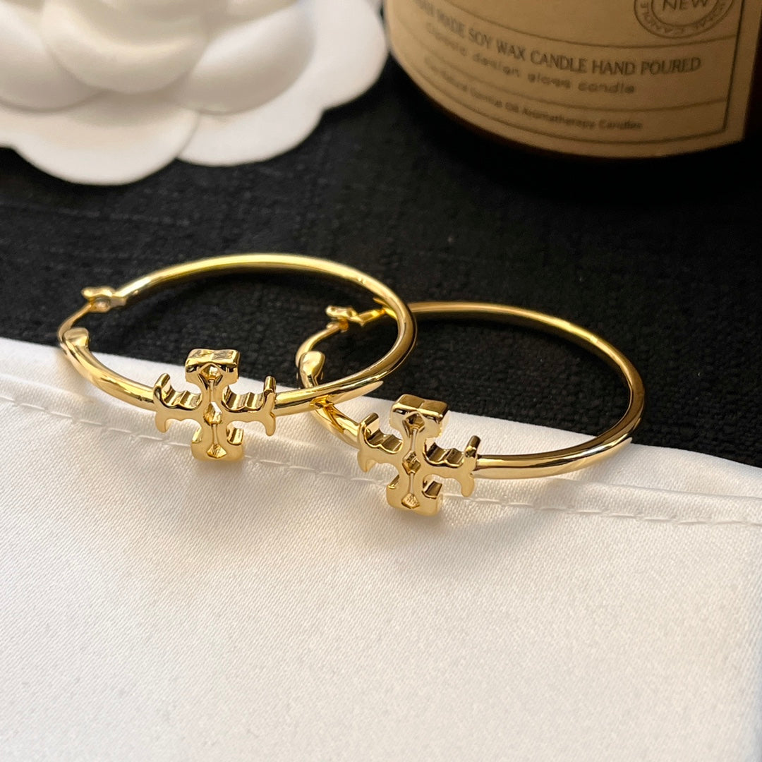 حلق توري بورش مدور كبير ميتال حلق tory burch