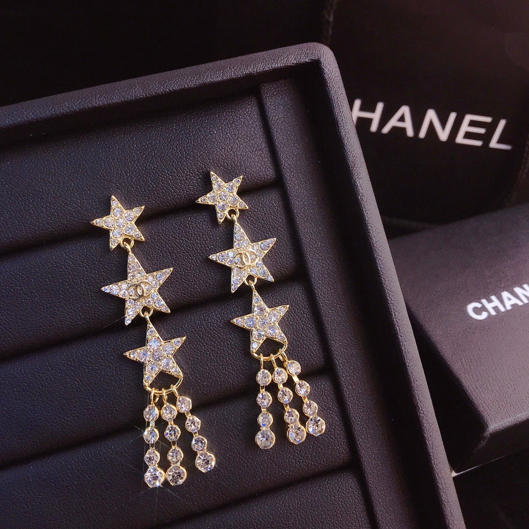 حلق شانيل طويل ثري ستارز حلق chanel ذهبي