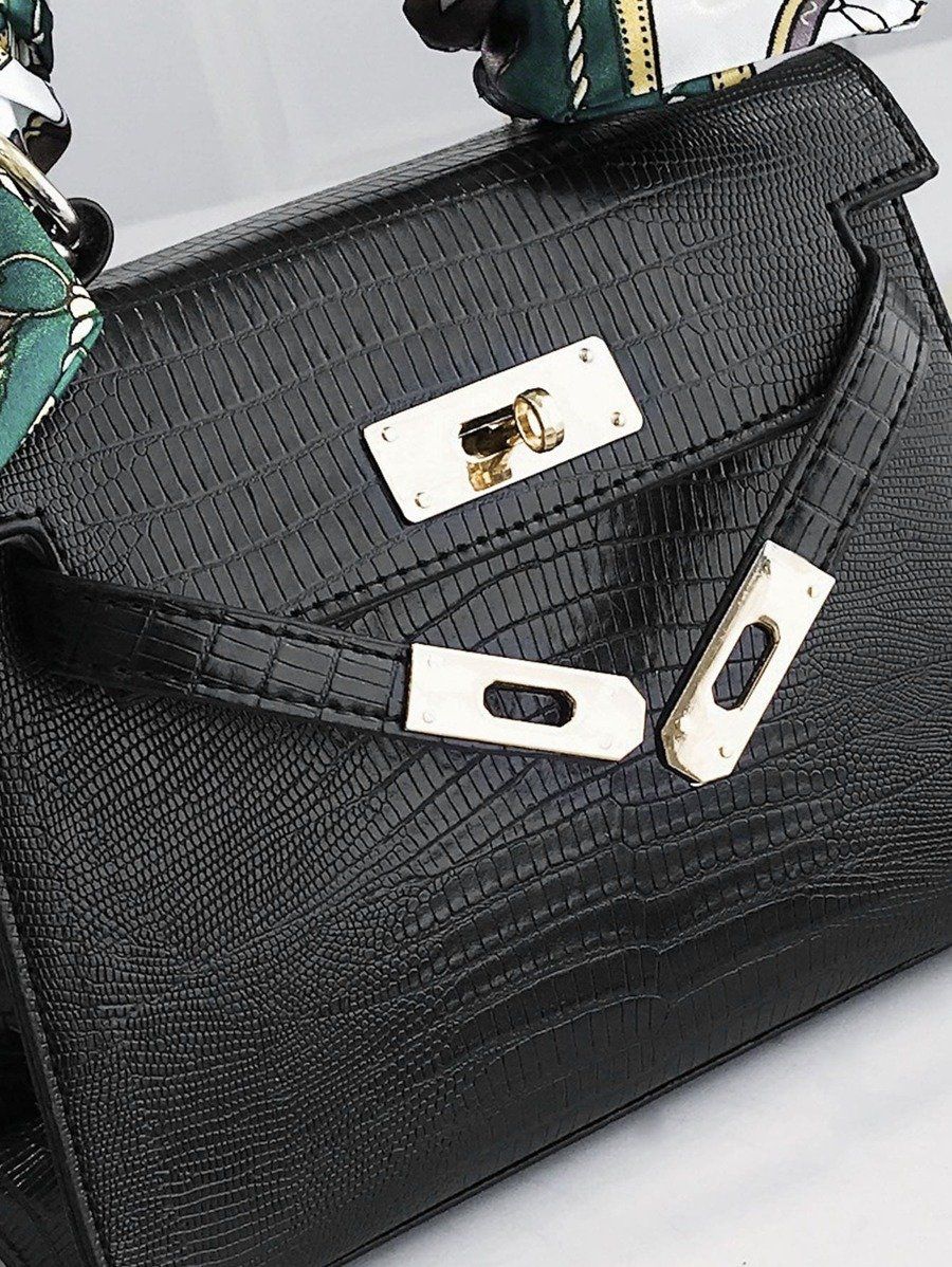 شنطة جلدية بقفل معدن ذهبي متوسطة الحجم شنط وحقائب شنط