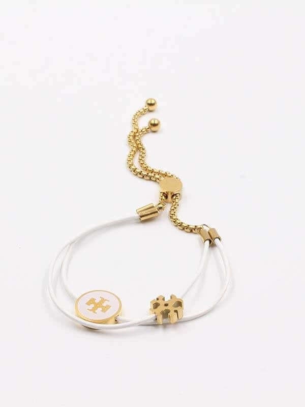 اسواره توري بورش سلايدر كيرا اسواره tory burch ابيض ذهبي