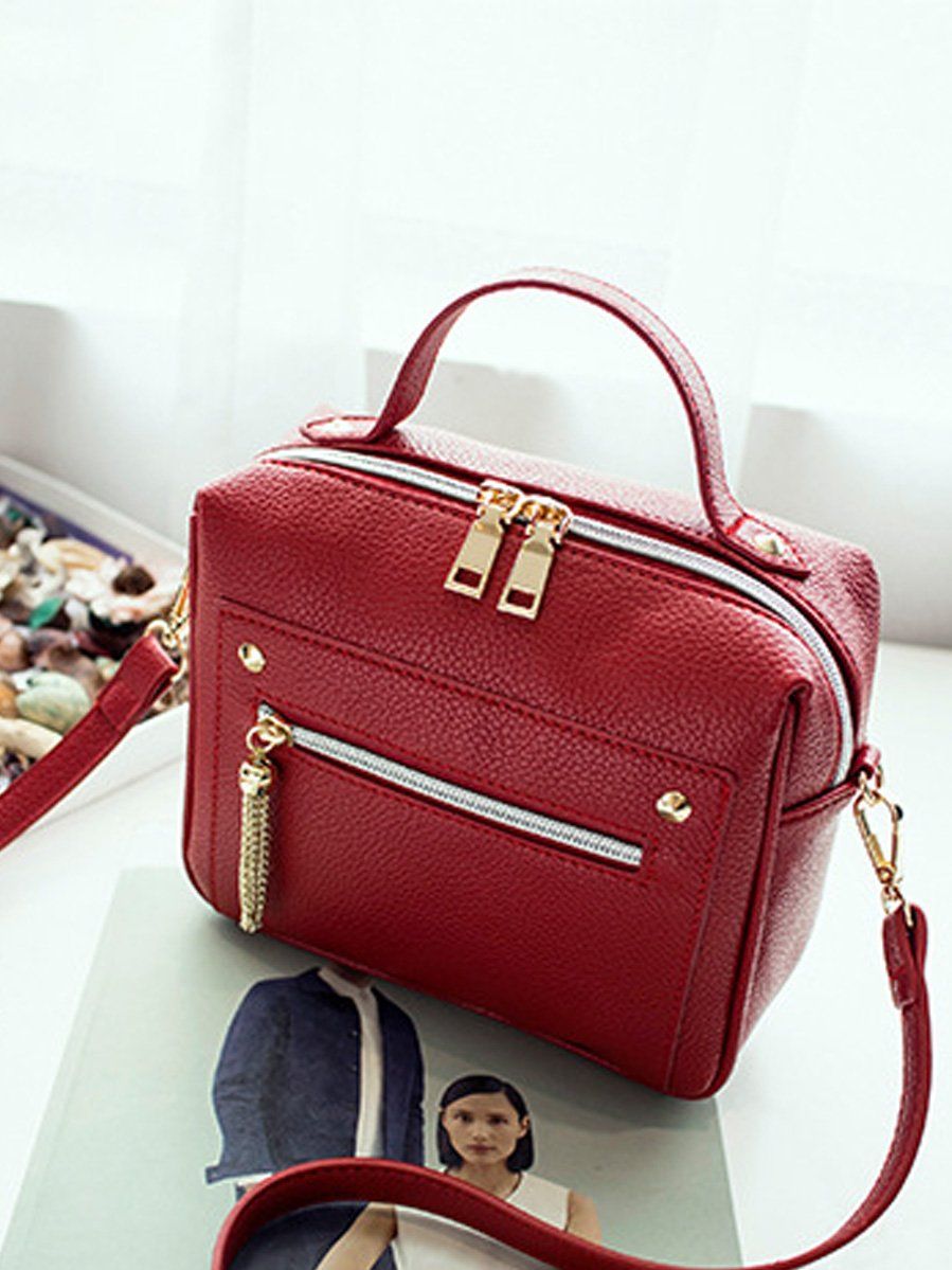 شنطه جلديه ريكتنقل ديزاين شنط وحقائب شنط عنابي