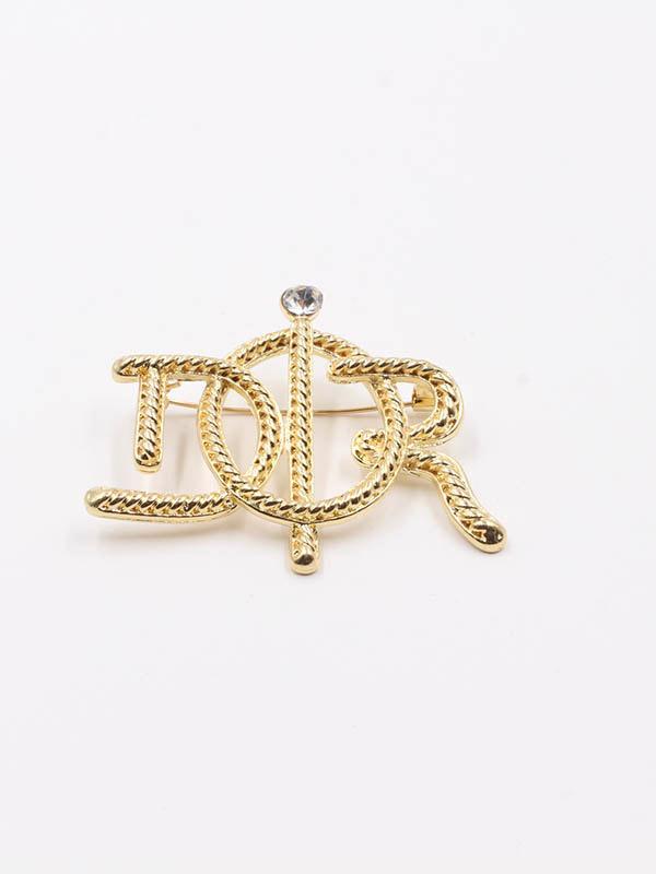 بروش ديور ذهبي بروش dior