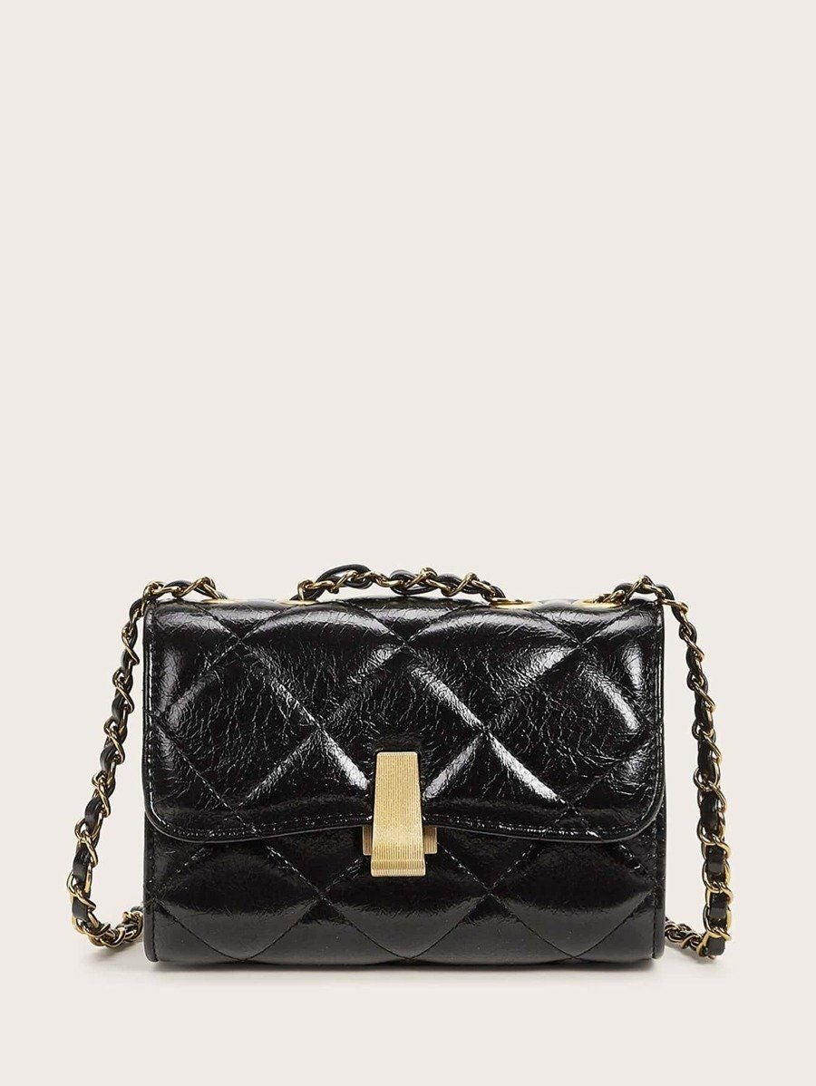 شنطة جلد بقفل معدني شنط وحقائب شنط اسود