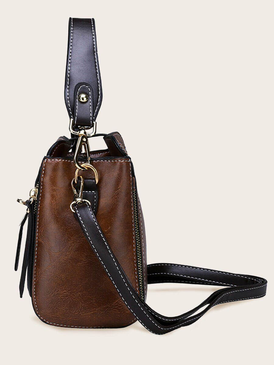 حقيبة جلد بني فاخر بتعليقة دب شنط وحقائب شنط