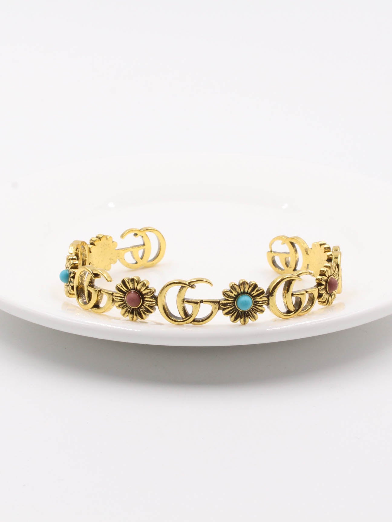 اسوارة قوتشي احجار ملونة بانقل اسواره gucci ذهبي