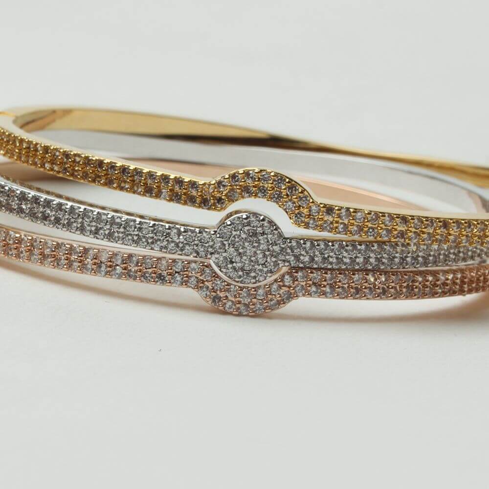 اساور وخواتمها مرصعه بالزركون بشكل مقوس اسواره متوفر 1 لون