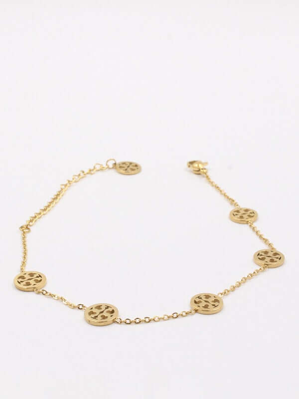 اسواره توري بوريش سمبل اسواره tory burch ذهبي