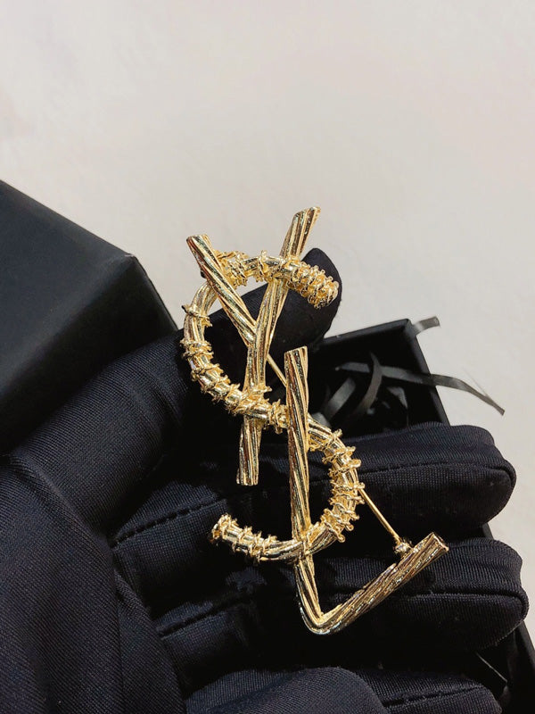 بروش ماركة ايف سان لوران بروش ysl