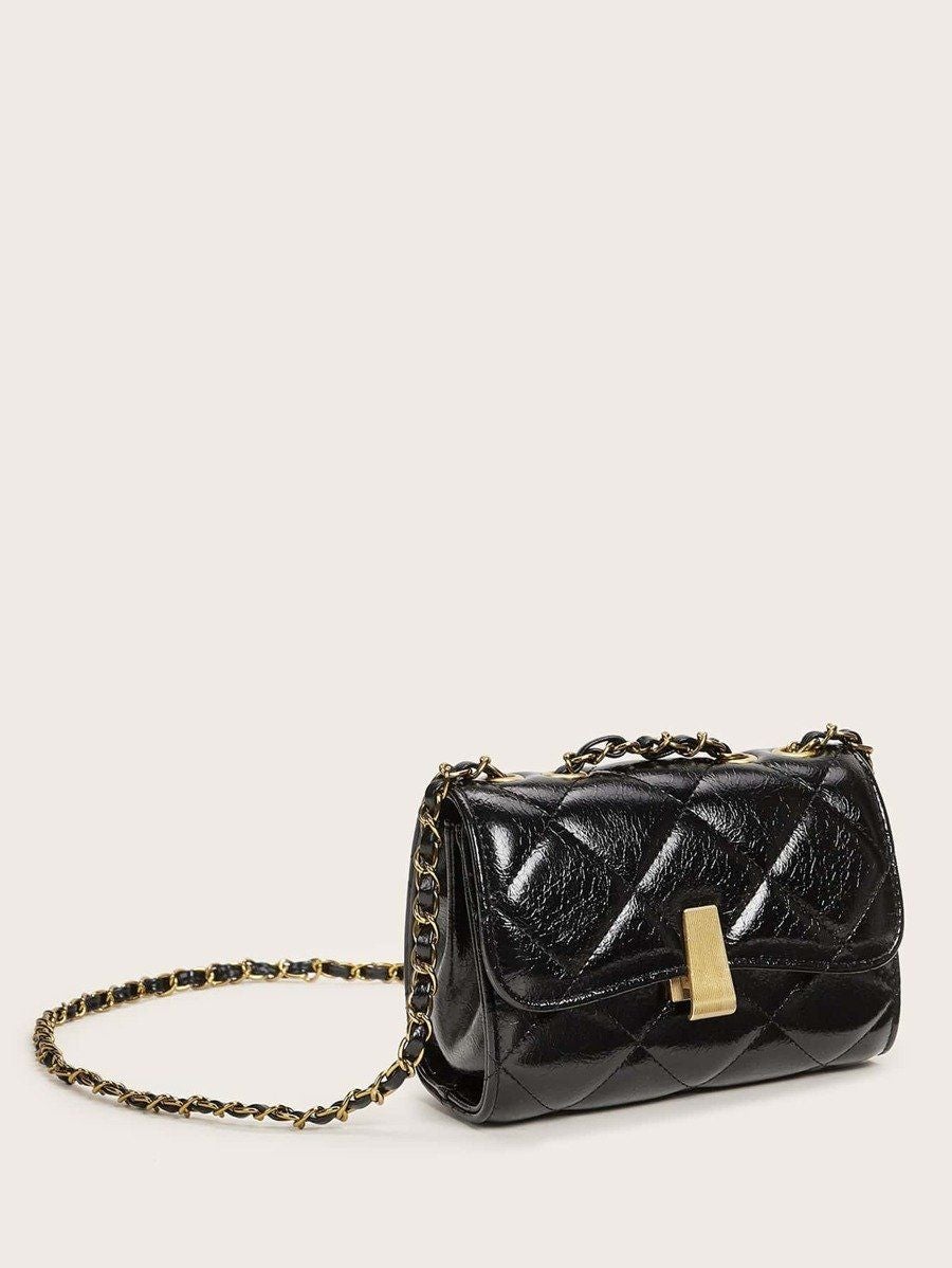 شنطة جلد بقفل معدني شنط وحقائب شنط