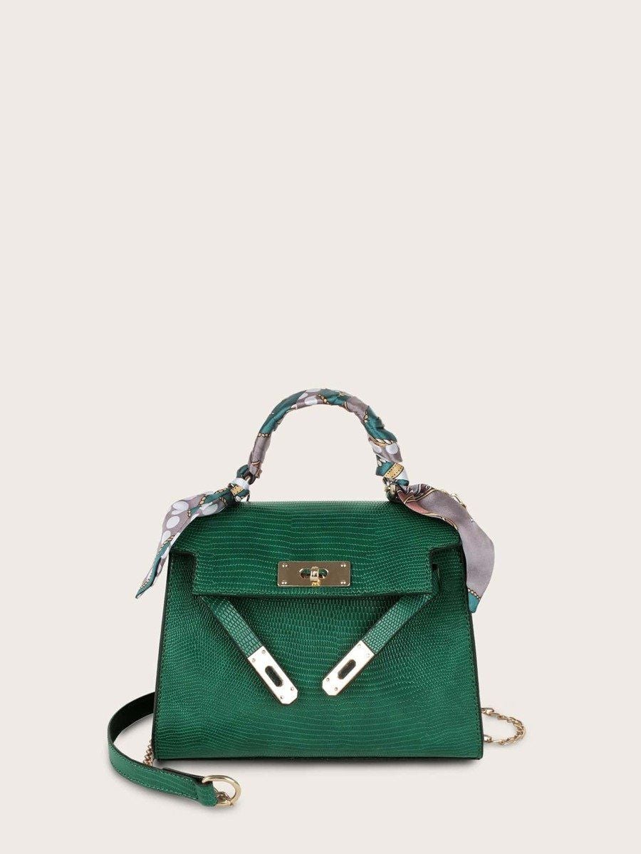 شنطة جلدية بقفل معدن ذهبي متوسطة الحجم شنط وحقائب شنط اخضر