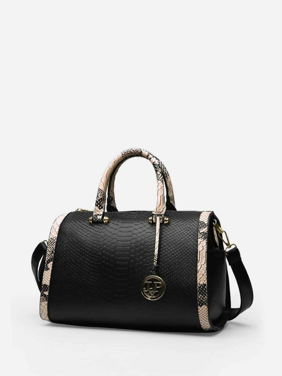 شنطة يد مزخرفة بجلد ثعبان شنط وحقائب شنط