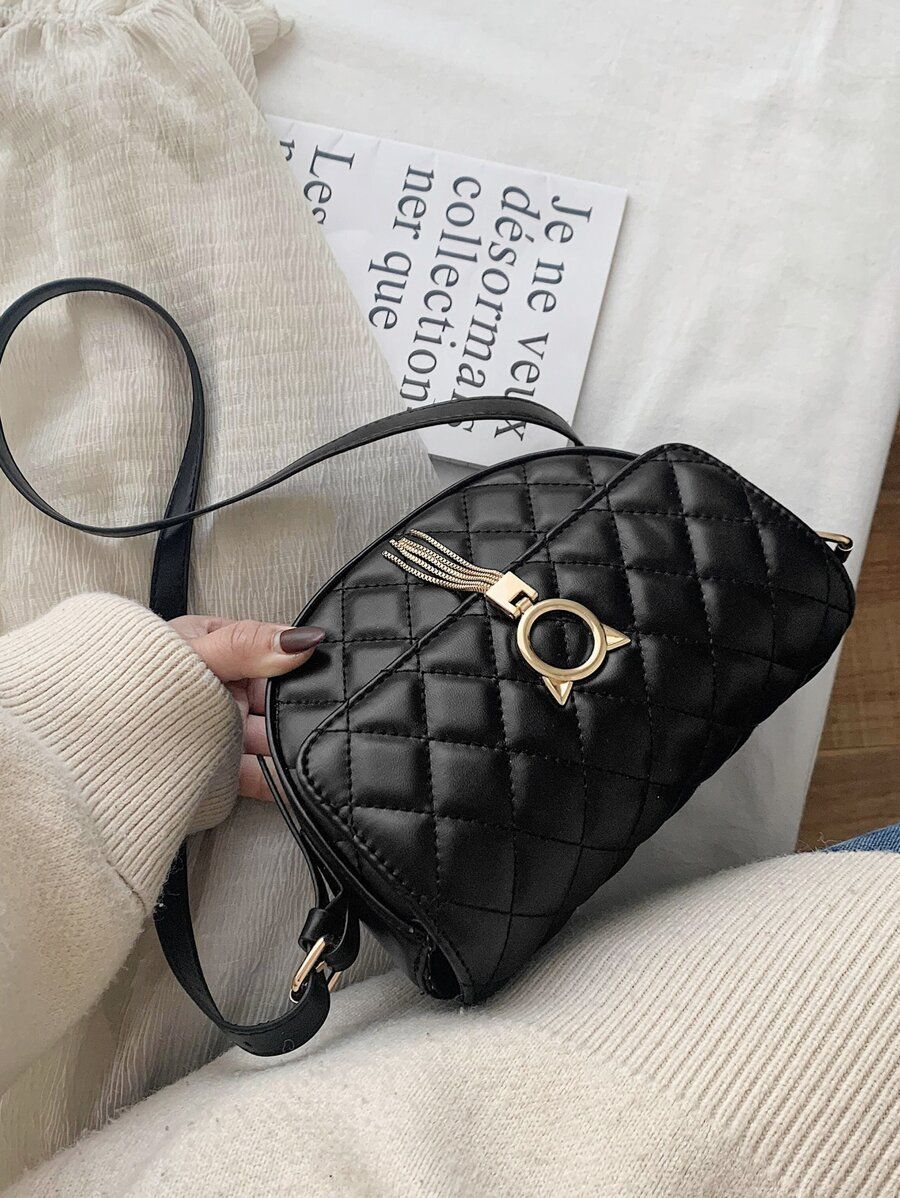 شنطة مبطنة بمربعات اسود شنط وحقائب شنط