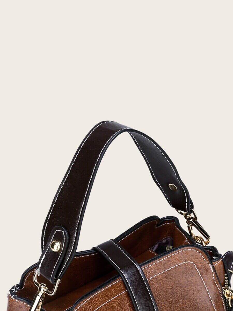 حقيبة جلد بني فاخر بتعليقة دب شنط وحقائب شنط