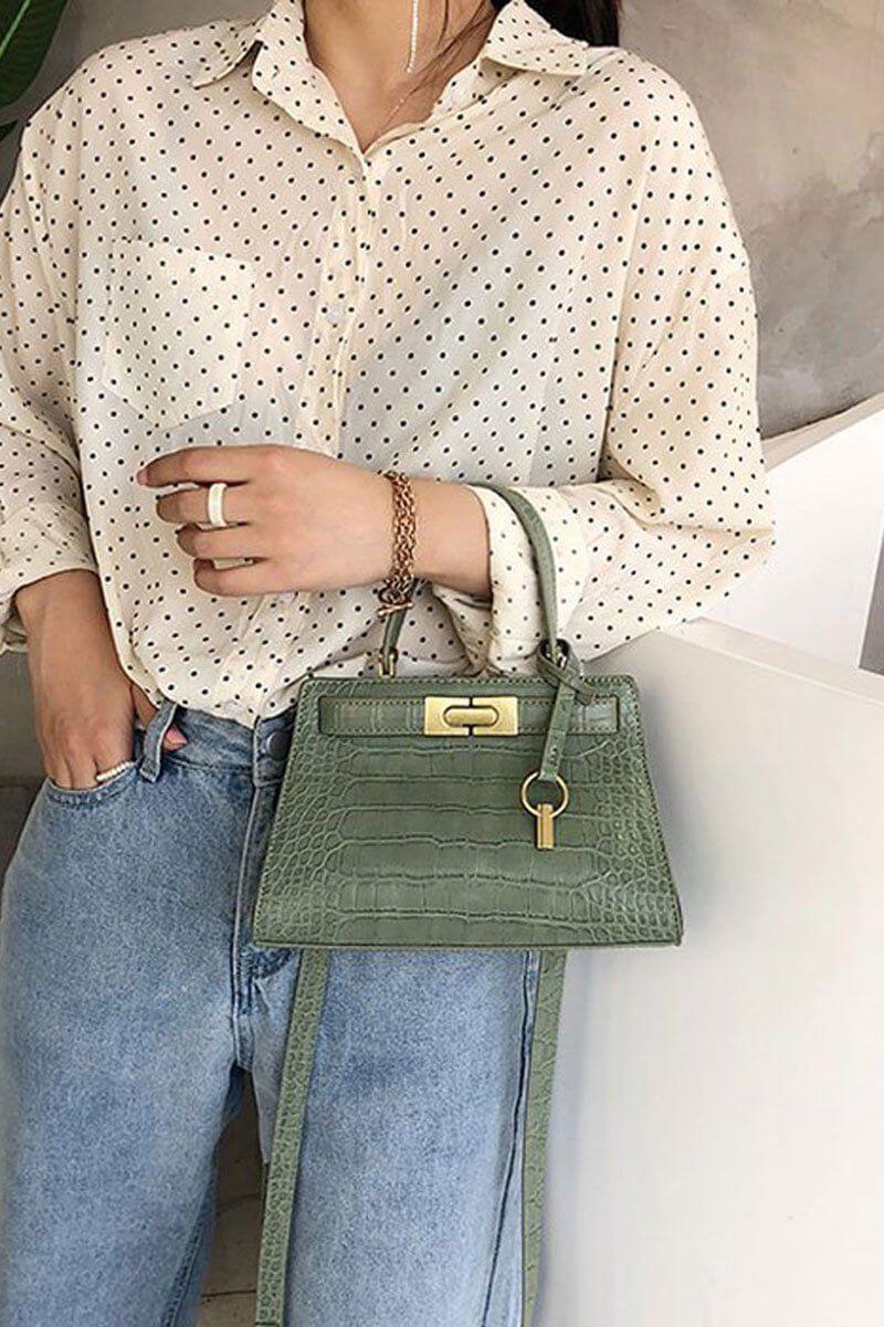 حقيبة جلديه انيقة متوسطة الحجم شنط وحقائب شنط