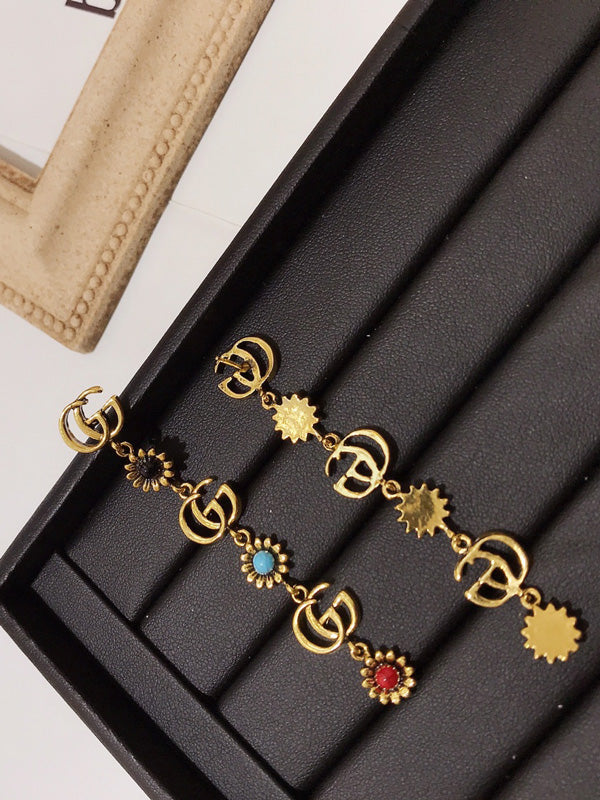 حلق قوتشي طويل حجر طبيعي حلق gucci