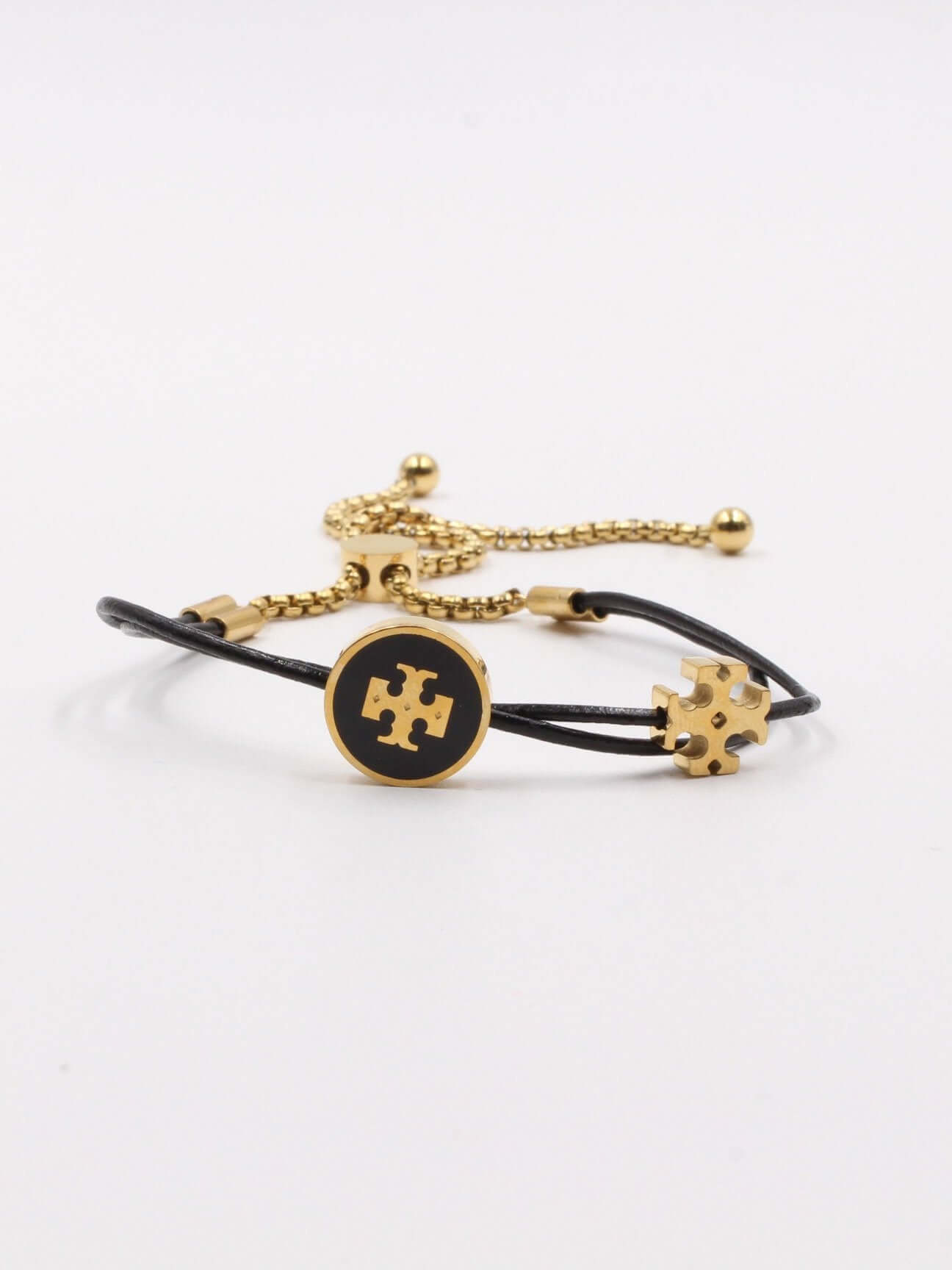 اسواره توري بورش سلايدر كيرا اسواره tory burch اسود ذهبي