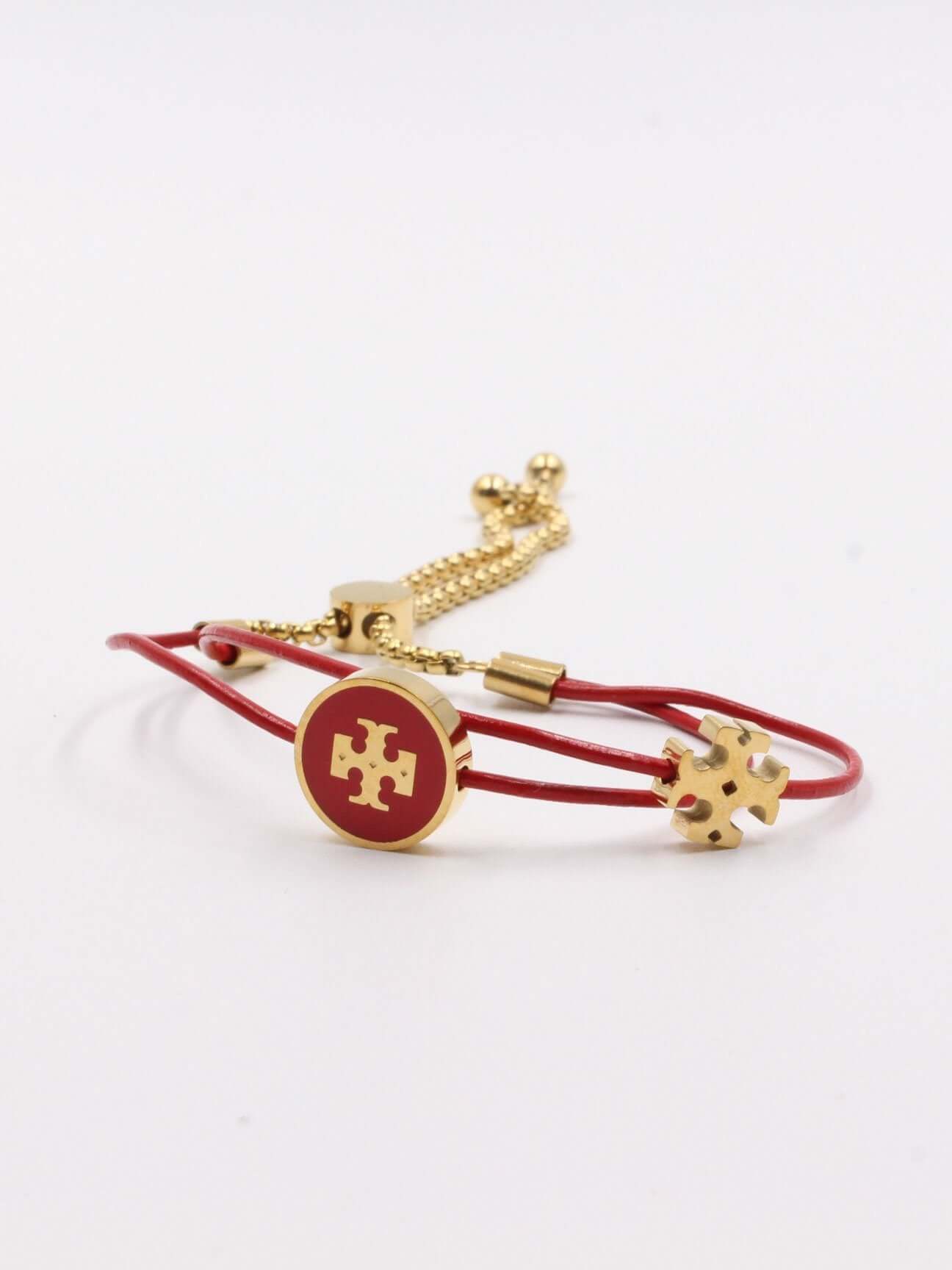اسواره توري بورش سلايدر كيرا اسواره tory burch احمر ذهبي