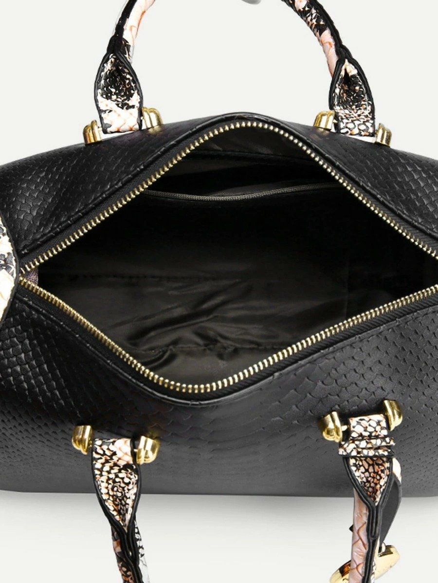 شنطة يد مزخرفة بجلد ثعبان شنط وحقائب شنط