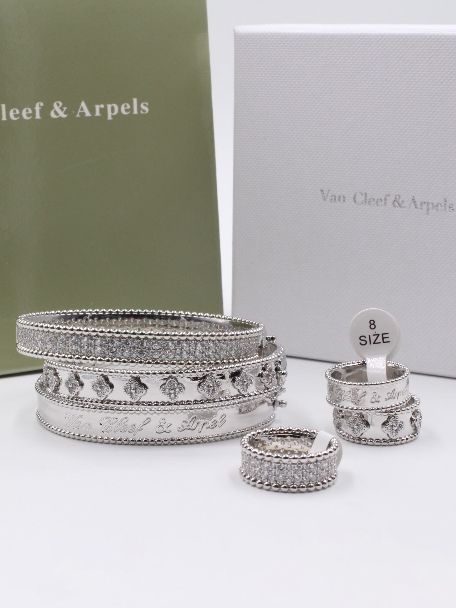 مجموعه اساور وخواتم فان كليف مرصعة زركون اسواره van cleef فضي 6