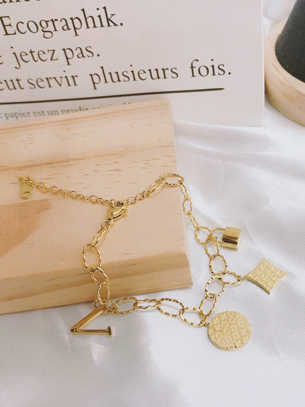 اسواره لويس فيتون ذهبية بتعليقات انيقة اسواره louis vuitton