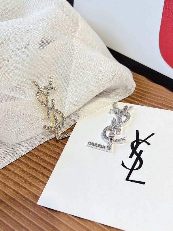 بروش ماركة ايف سان لوران كريستال بروش ysl