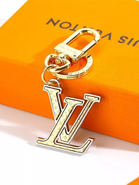 ميدالية ال في ذهبي وفضي ميدالية louis vuitton