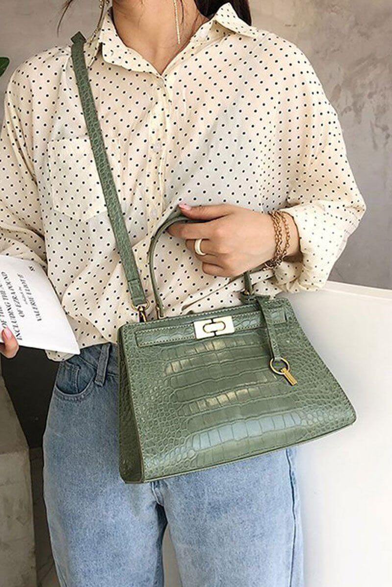 حقيبة جلديه انيقة متوسطة الحجم شنط وحقائب شنط