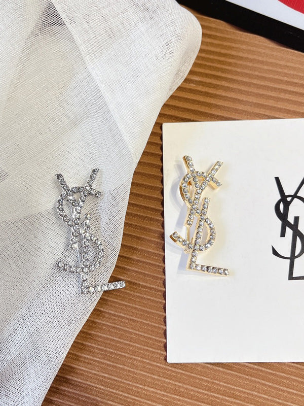بروش ماركة ايف سان لوران كريستال بروش ysl