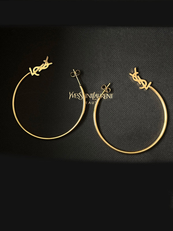 حلق ايف سان لوران مدور كبير حلق ysl ذهبي