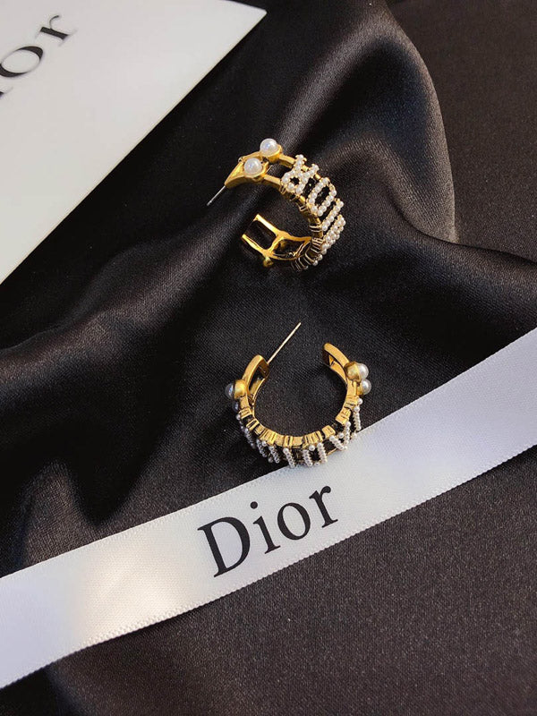 حلق ديور مدور وسط انتيك حلق dior ذهبي