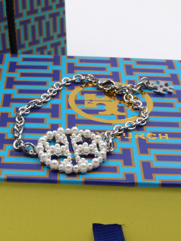 اساور توري بورش لولو دائرية اسواره tory burch