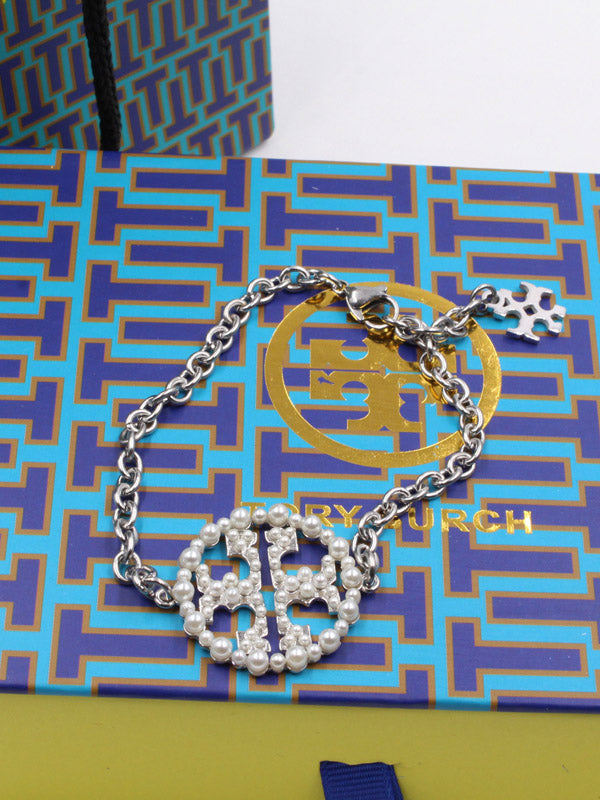 اساور توري بورش لولو دائرية اسواره tory burch