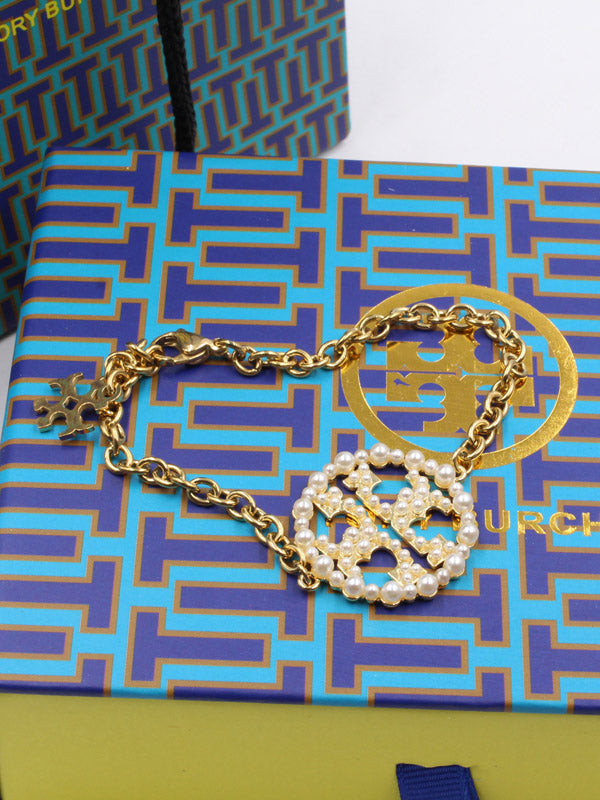 اساور توري بورش لولو دائرية اسواره tory burch