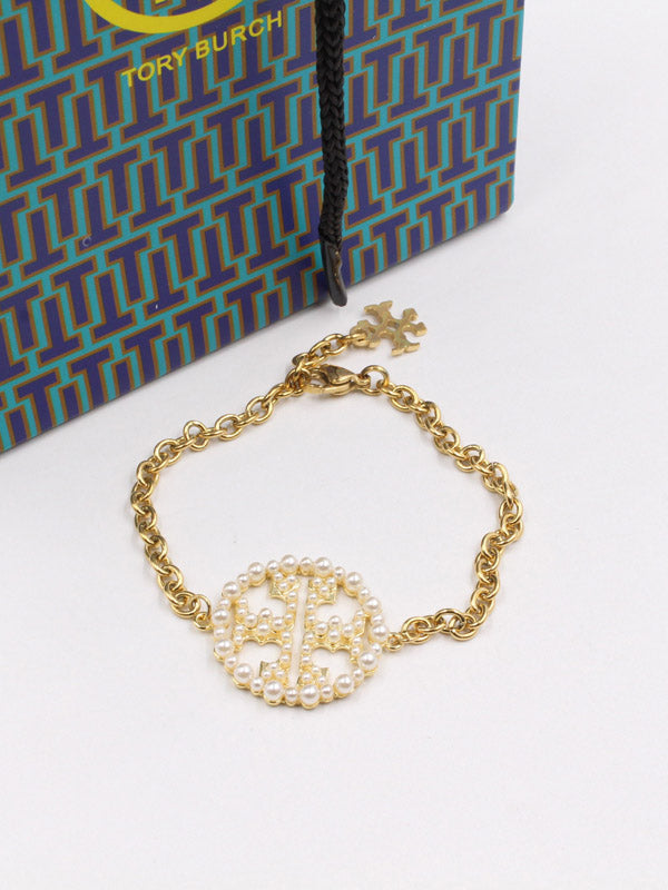 اساور توري بورش لولو دائرية اسواره tory burch ذهبي