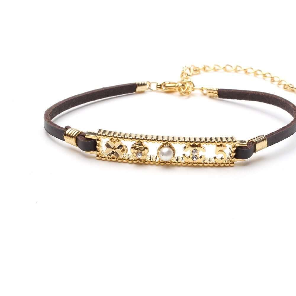 اسواره شانيل جلد اسواره chanel اسود ذهبي