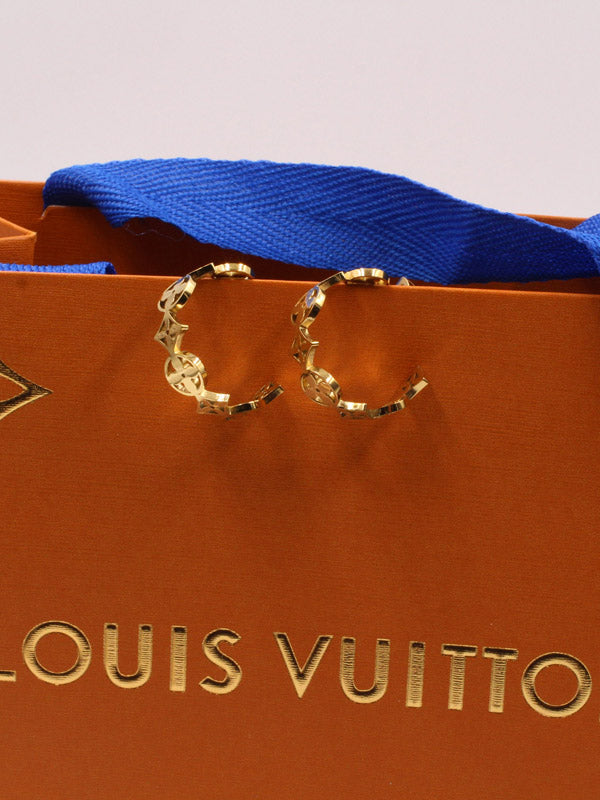 حلق لويس فيتون وسط ميتال حلق louis vuitton ذهبي