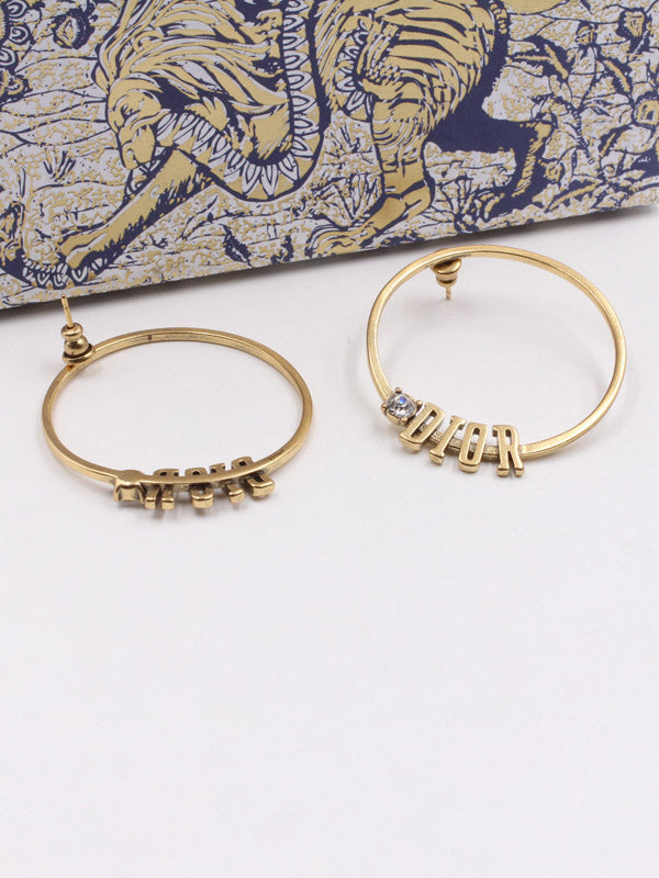 حلق ديور كبير انتيك برونز حلق dior ذهبي