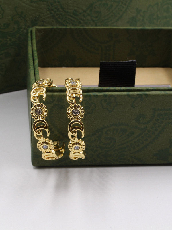 حلق قوتشي كبير كيرف كريستال حلق gucci ذهبي