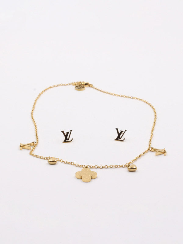 طقم لويس فيتون عقد وحلق ناعم ذهبي اطقم louis vuitton