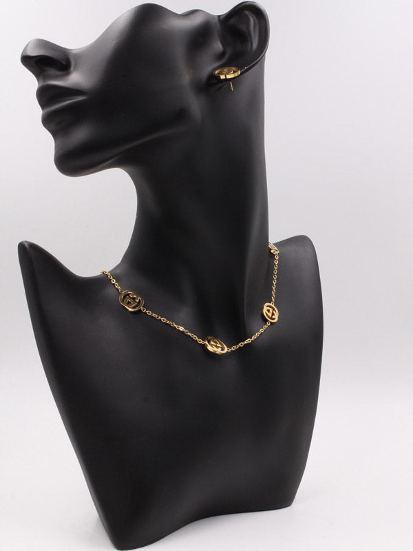 طقم قوتشي عقد وحلق ناعم ذهبي اطقم gucci