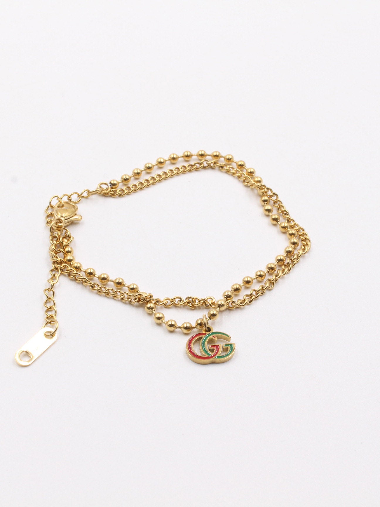 اساوِر قوتشي دبل شاين اسواره gucci ذهبي