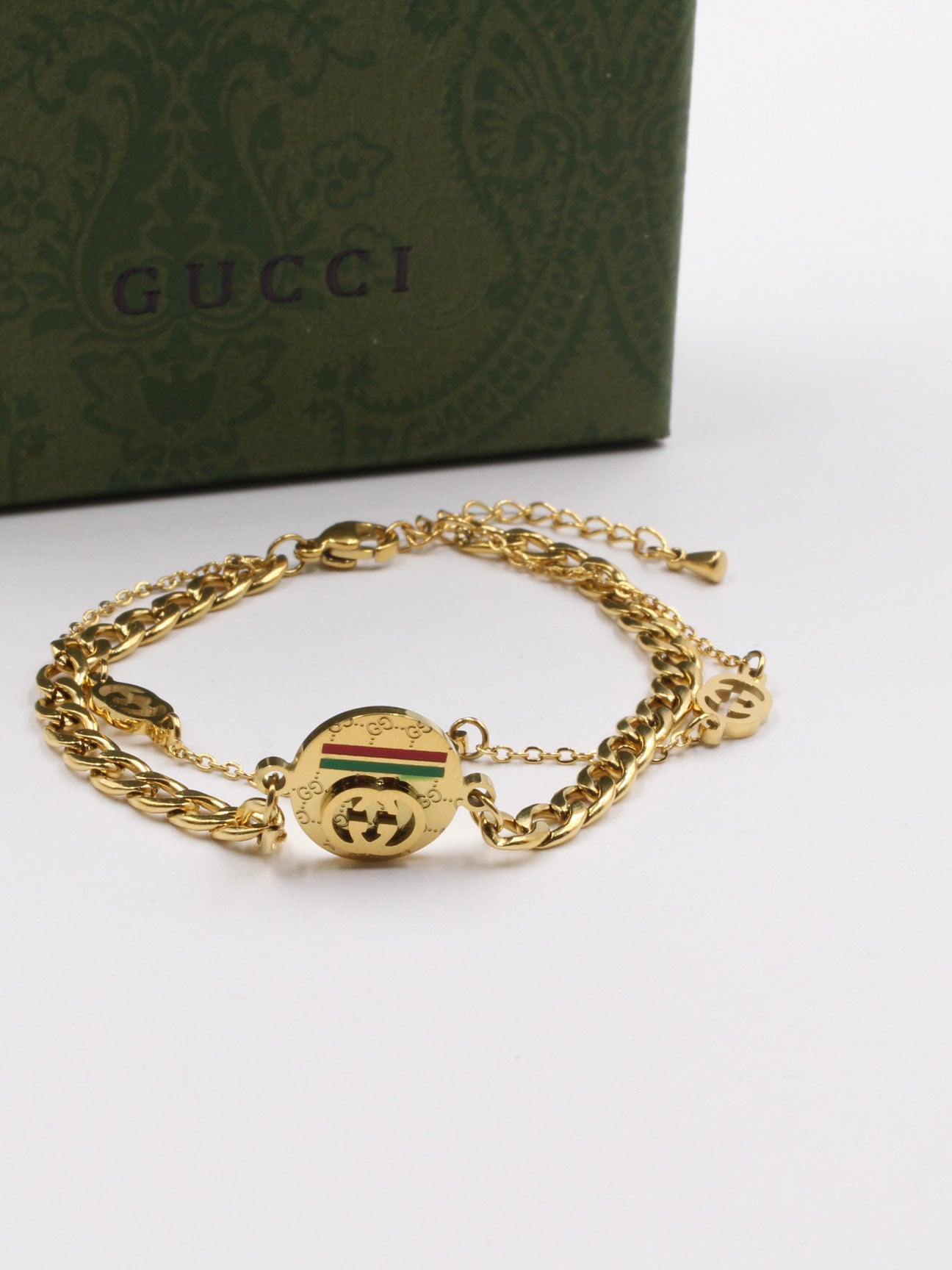 اساوِر قوتشي دبل شاين لوقو اسواره gucci ذهبي